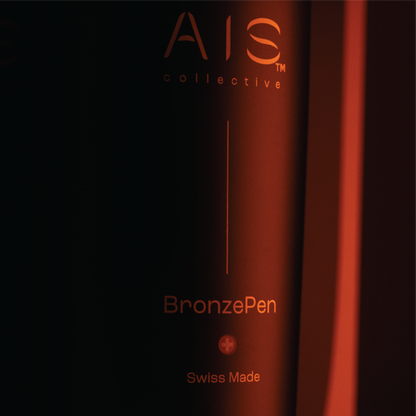 Sleek close-up detail of the premium Swiss-made bronze watch care bottle by AIS Collective.