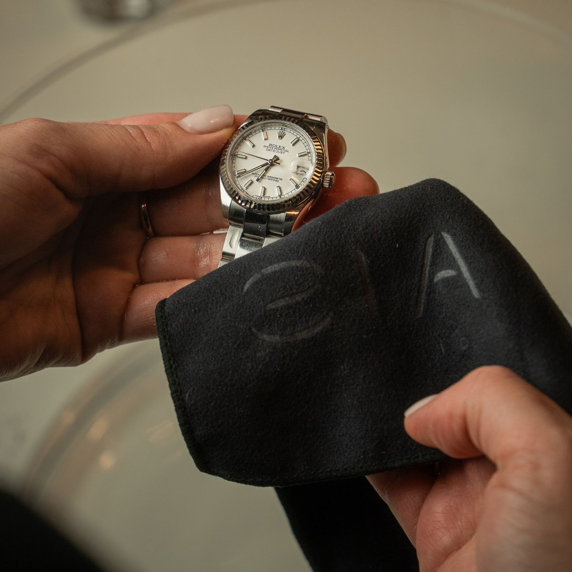 ChronoCloth cleaning a women Rolex watch