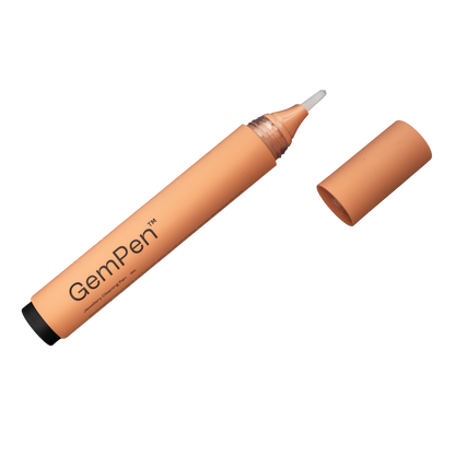 GemPen, the ultimate jewellery cleaning accessory, with an open cap, showing the soft brush, especially developed to reach every spot of fine jewellery