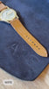 Wipe all excessive liquid off the leather strap with the dry microfiber towel included in the box.
