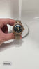3. Rinse the watch and the brush of the BronzePen under clean, lukewarm water.