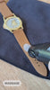 Start massaging the solution  onto and into the leather strap in a circular motion with the silicon brush.
